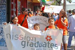 Mission Graduates March with a Message