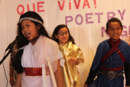 Three students performing