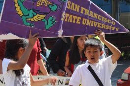 Students holding sign from San Francisco State University