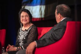 Civil rights leaders Dolores Huerta and Andrew Young discuss social justice efforts at The Summit on Race in America a the LBJ Presidential Library in 2019.